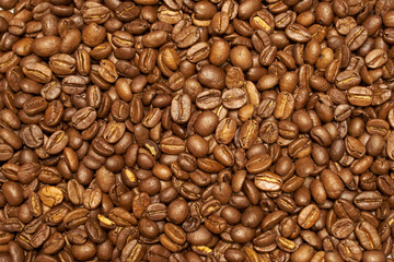 Roasted coffee beans as a background. Kitchen concept.