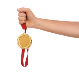Fototapeta na wymiar Woman holding gold medal on white background, closeup