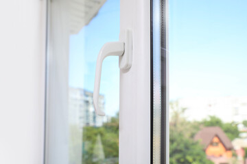 Closeup view of modern white plastic window