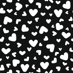 Fototapeta na wymiar Hearts seamless pattern. Randomly placed heart shapes all over print graphic.
