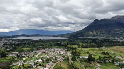 Fototapeta na wymiar Aerial view of beautiful panoramic view of the city of Otavalo in Ecuador