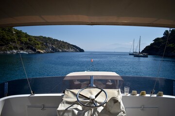 View of sea from wheelhouse on boat © keremberk