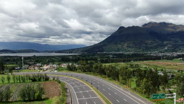 Aerial view of beautiful panoramic view of the city of Otavalo in Ecuador, San Pablo Lake from the street