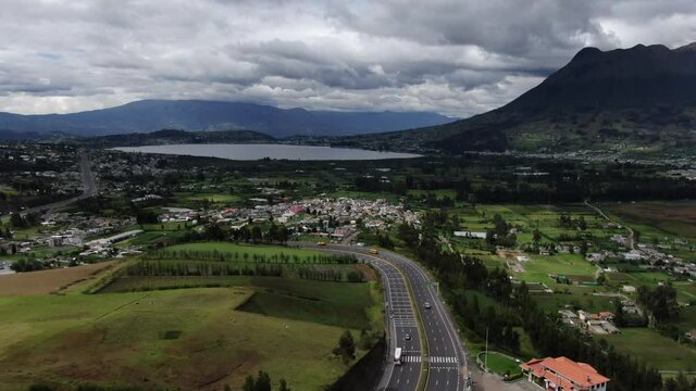 Aerial view of beautiful panoramic view of the city of Otavalo in Ecuador, San Pablo Lake from the street