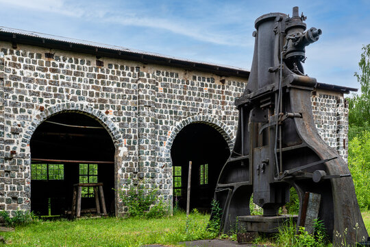 Old forge hammer outside a closed-down steel mill in Sweden