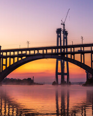 preobrazhensky bridge across the new dnieper unfinished bridges sunrise