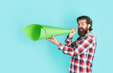 Propaganda or Truth. free man shouting into megaphone. Handsome man shouting through speaker. loud...
