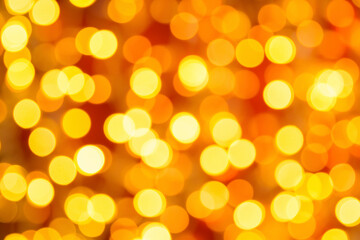 Full frame shot of golden defocused lights on red backgroound