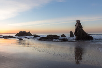 Low tide at sunrise on El Matador Beach in Malibu, California