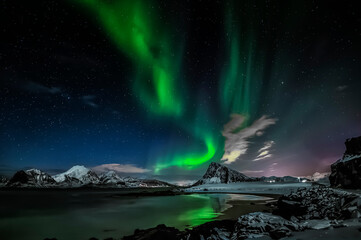 Northern lights on sky in Lofoten islands