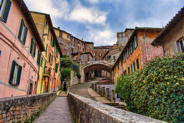Fototapeta premium Perugia, via the aqueduct ancient brick arch construction where water flows in the 12th century