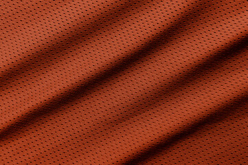 Orange football, basketball, volleyball, hockey, rugby, lacrosse and handball jersey clothing fabric texture sports wear background
