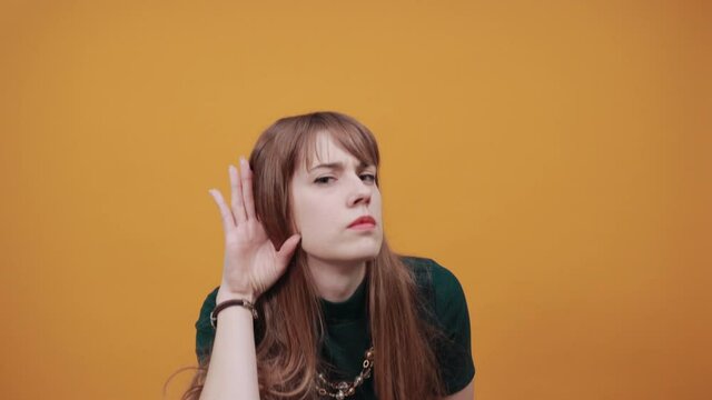 Imitates telephone conversation, keeps hand near ear as if holding mobile phone. Talking on smartphone simulates. Call with her finger. Asks to recall. Pretending that speaking with somebody