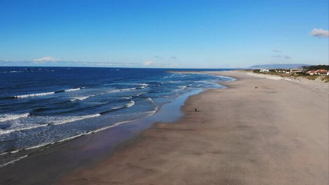 DRONE AERIAL FOOTAGE: The Ofir Beach. South of the mouth of the River C&aacute;vado, integrated in the Natural Park of the North Coast, the beach of Ofir surrounded by pine forests and dune vegetation.