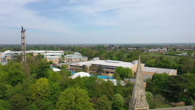 Aerial footage of the large University of York in the City of York in North Yorkshire, UK Academic teaching and research institution, founded in 1963, with a modern campus colleges buildings