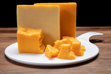 Cheese collection, orange and yellow smoked British cheese from England