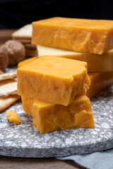 Cheese collection, orange and yellow smoked British cheese from England