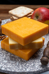 Cheese collection, orange and yellow smoked British cheese from England