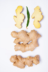 Fresh ginger rhizome root used in traditional medicines and for flavoring meals isolated on white