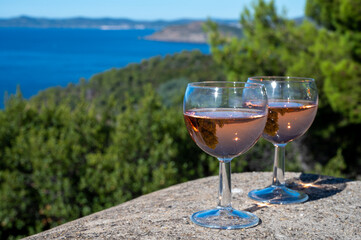 Picnic with of local rose wine and blue Mediterranean sea on background, near Saint-Tropez, Var, Provence, France
