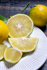 Fototapeta na wymiar Fresh ripe bergamot orange fruits, fragrant citrus used in earl grey tea, medicine and spa treatments