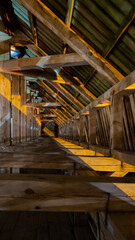 Obraz premium Ruins of Sigulda Medieval Castle, Latvia. Old Fortress Wooden Tower Interior With Window Hatches Night Shot.