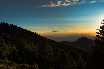 Picturesque sunset in the mountains. A calm evening fell on mountains