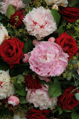 Peonies and roses in a bridal bouquet