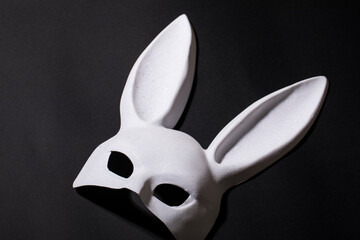 rabbit latex mask. Dark background. 