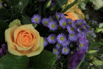Roses and asters in a bridal bouquet