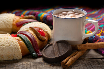 Kings day bread also called epiphany cake on wooden background