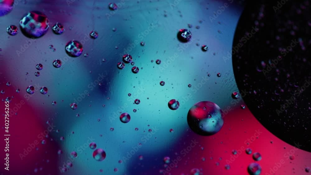 Poster abstract multicolor background with bubbles. colorful bright organic backdrop. oil drops in water wi