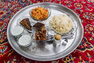  Meal in Iran - Grilled fish with a salad, yogurt, eggs and rice