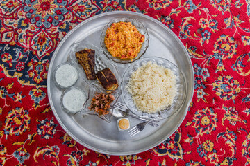  Meal in Iran - Grilled fish with a salad, yogurt, eggs and rice