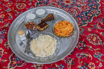  Meal in Iran - Grilled fish with a salad, yogurt, eggs and rice