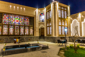 ARDABIL, IRAN - APRIL 9, 2018: Night view of a courtyard restaurant in Ardabil, Iran