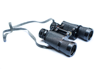 vintage binoculars with white background