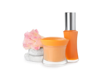 Cosmetic products, flower and spa stones on white background