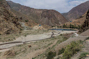 Khurdak lake and Padrud village in Marguzor (Haft Kul) in Fann mountains, Tajikistan