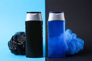 Bottles with shower gel and bast wisps on color background. Men's cosmetics
