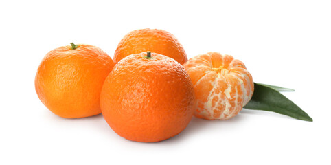 Fresh ripe tangerines with green leaves on white background