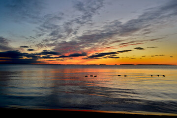 Fototapeta na wymiar sunset by the lake