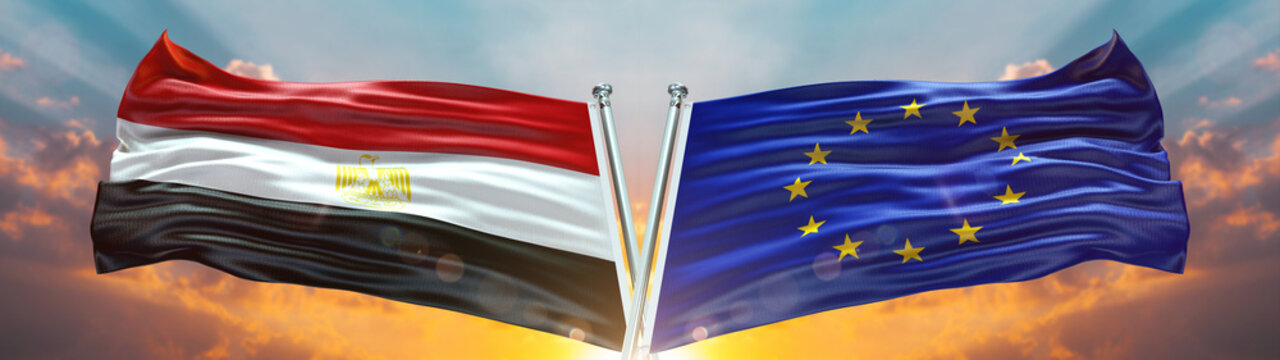 Double Flag European Union vs Egypt flag waving flag with texture sky clouds and sunset background