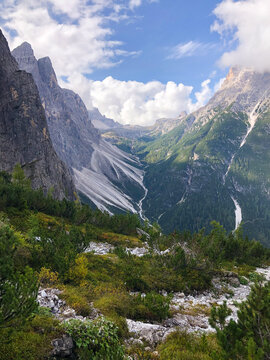 Hiking in late summer and autumn close to mountains top. Italia. Italian Dolomites. Schlern-Rosengarten.