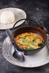 Delicious cream soup with fresh salmon with vegetables and spices. Lunch gourmet