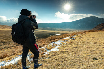 カメラマンと冬の草千里