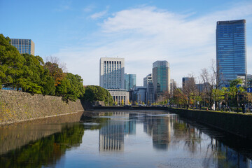 Fototapeta na wymiar Reflection on Skyscrapers near Imperial Palace Chiyoda city Tokyo Japan