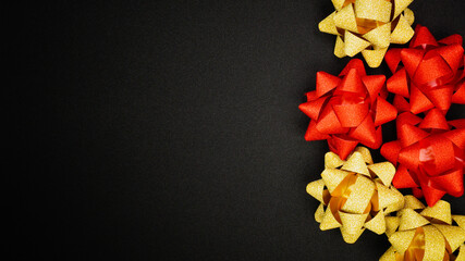 Gold and red sparkling star ribbons on Black background