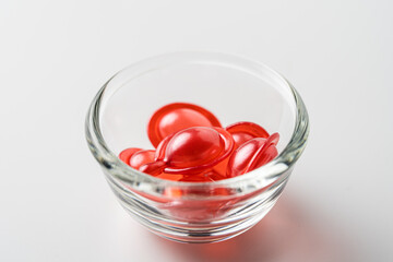 Close up of Hair nourishing vitamins on white background.