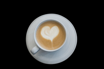 Top view of coffee cup on wood floor.